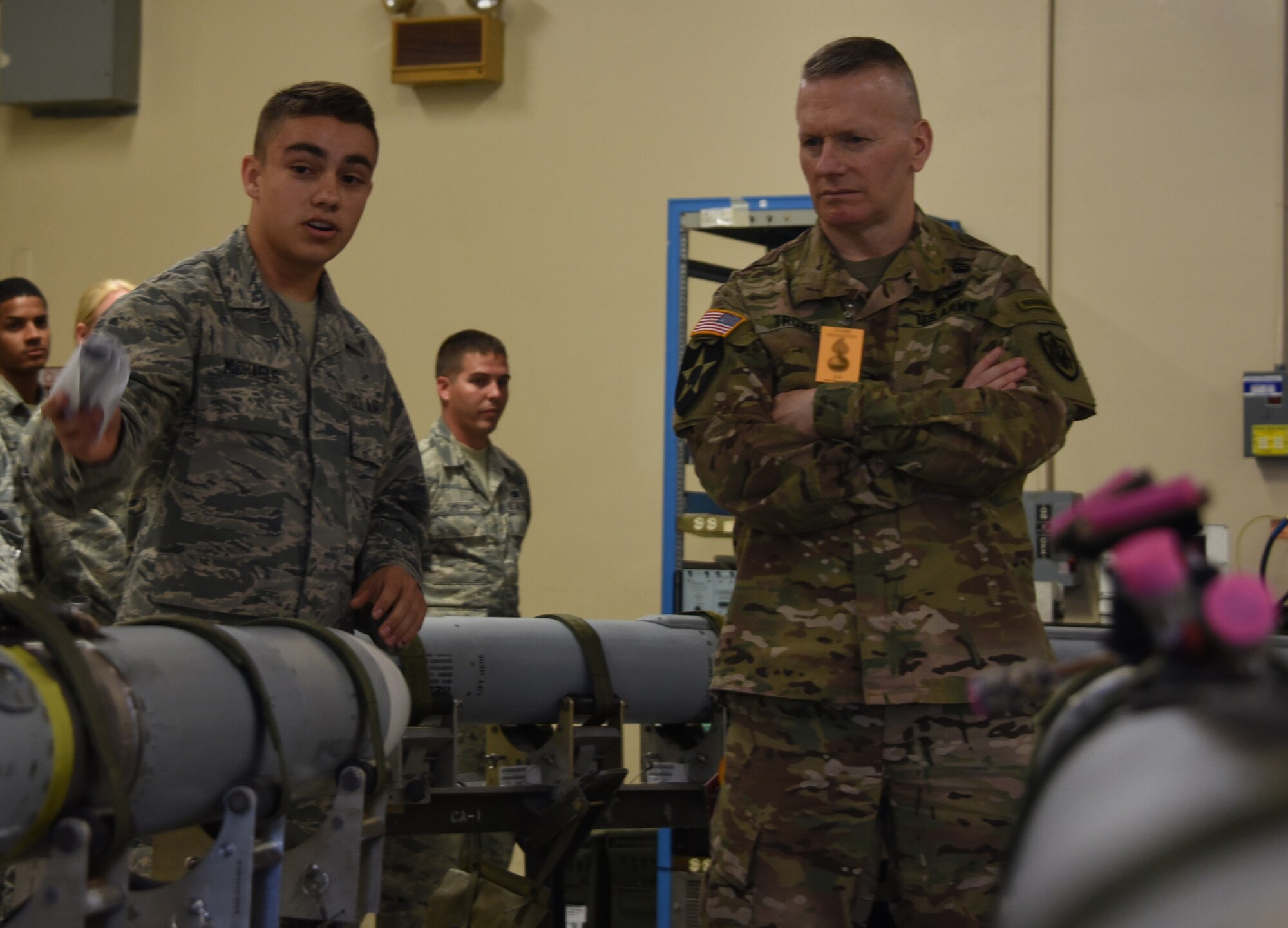 U.S. Army Command Sgt. Maj. John Wayne Troxell, Senior Advisor to the Chairman of the Joint Chiefs of Staff receives a brief.