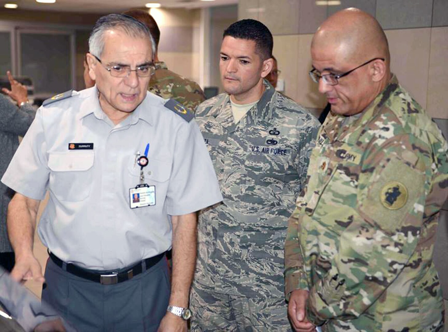 (From left) Chilean Army Lt. Col. Pablo Larraguibel, U.S. Army Lt. Col. Eric Lombardini and Chilean Army Maj. Claudia Lucar participate an exercise focusing on a vector-borne risk assessment pre-deployment scenario April 17.