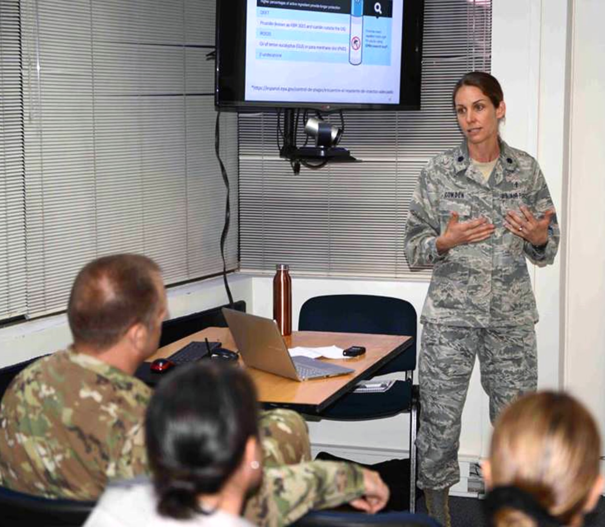 U.S. Air Force Lt. Col. Jessica Cowden from the Defense Institute of Medical Operations, gives a lecture on preventive measures for malaria to Chilean Army Veterinary Corps Soldiers and attendees during a vector control practices seminar in Santiago, Chile, April 17. Cowden specializes in infectious diseases and pediatric medicine.
