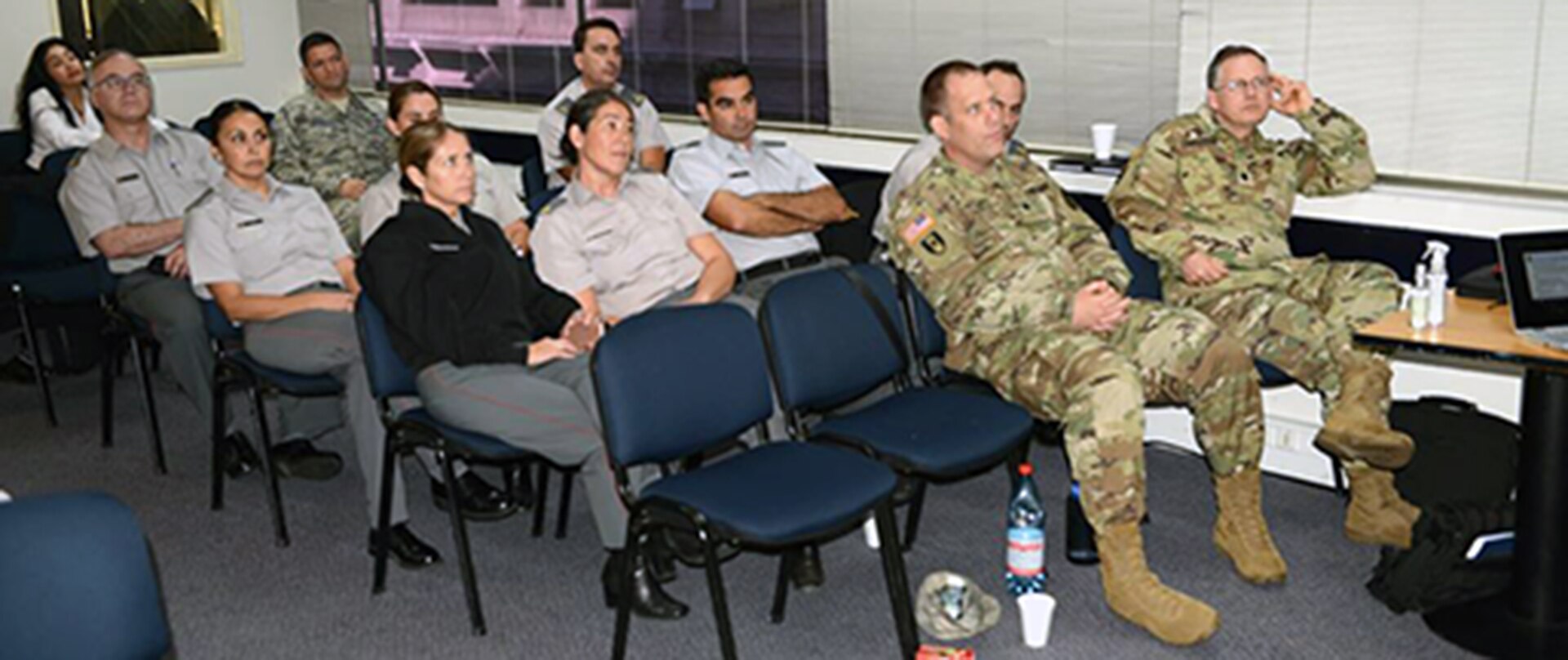 Soldiers from the Chilean Army Veterinary Corps and the U.S. Army listen to a lecture during a vector control practices seminar in Santiago, Chile, April 17.