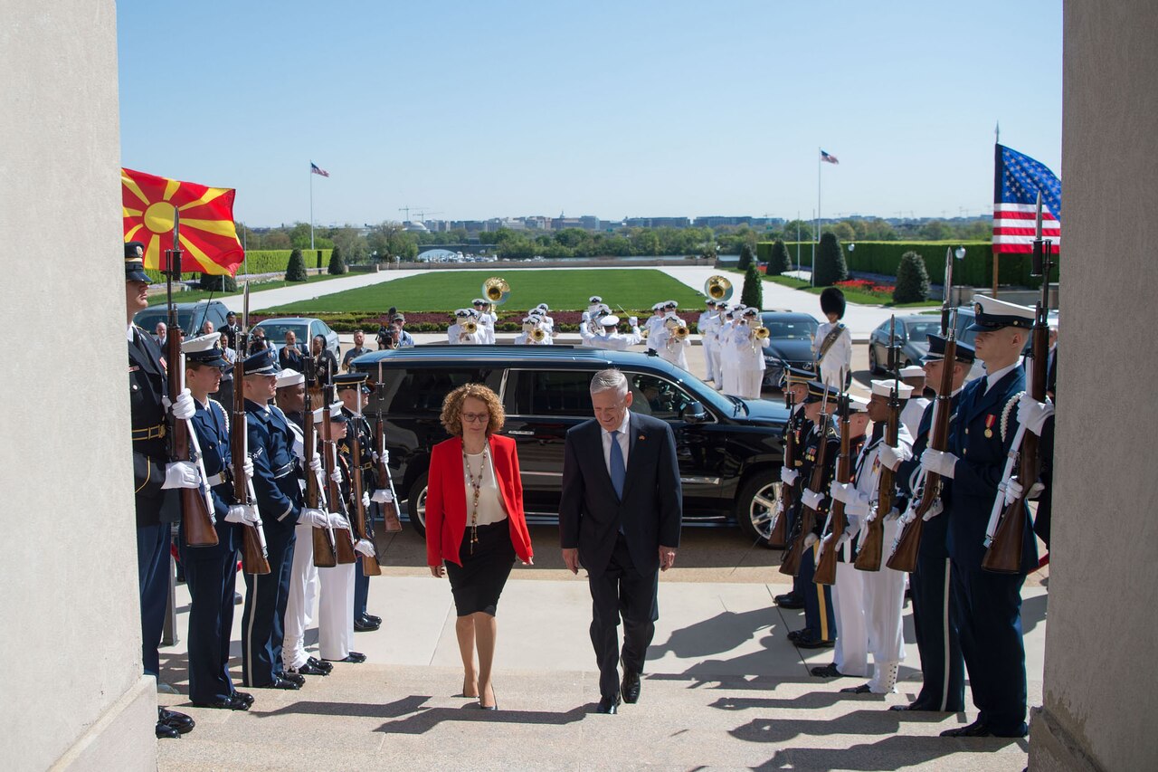 Defense Secretary James N. Mattis and the Macedonian defense minister walk up the steps of the Pentagon.