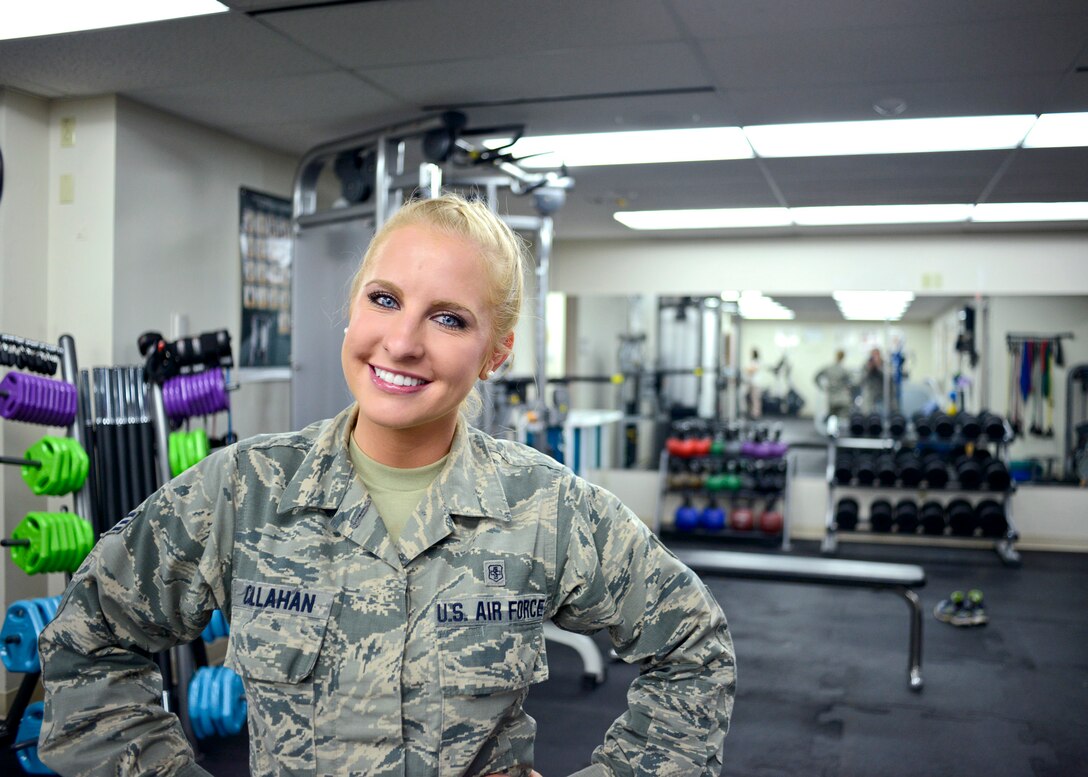 Then-Air Force Senior Airman Kaitlyn Callahan, 341st Medical Operations Squadron physical medicine technician, poses for a photo in the clinic at the Malmstrom Air Force Base, Montana, clinic.