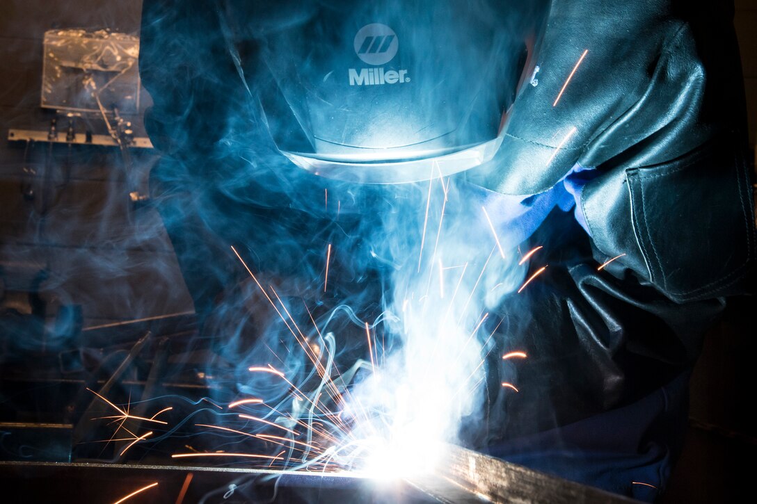 Airman 1st Class Isaiah Jackson, 23d Maintenance Squadron aircraft metals technology journeyman, welds components of a table, April 25, 2018, at Moody Air Force Base, Ga.  Metals technicians support the mission by utilizing fabrication techniques to repair and overhaul countless tools and aircraft parts. The technicians strive to exercise safe and precise fabrication techniques to be able to sufficiently handle their intense workload. (U.S. Air Force photo by Airman 1st Class Eugene Oliver)