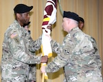 Col. Clinton W. Schreckhise (right), commander, 32nd Medical Brigade, presided over the change of responsibility ceremony as Command Sgt. Maj. Thomas R. Oates relinquished responsibility to Command Sgt. Maj. Carlisie Y. Jones (left) at Blesse Auditorium at the Army Medical Department Center & School at Joint Base San Antonio-Fort Sam Houston May 1. Oates is transitioning to serve as the command sergeant major at Brooke Army Medical Center. Jones comes to the 32nd Medical Brigade from the Medical Professional Training Brigade.