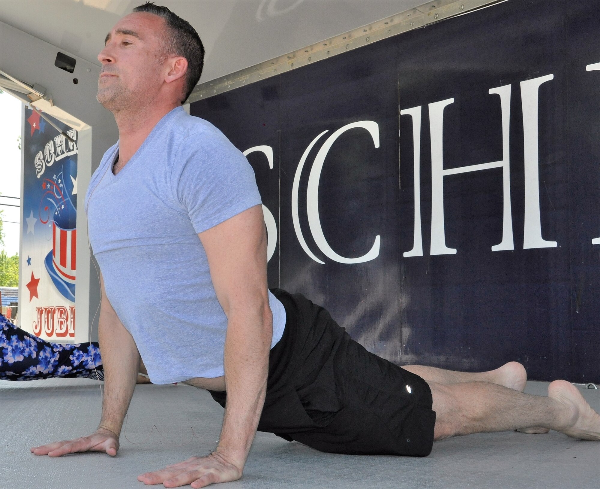 Lt. Col. Thomas Lessner teaches body flow (a hybrid of tai chi, pilates and yoga) during the recent City of Schertz “Movin’ on Main” community health event. (U.S. Air Force photo by Debbie Gildea)