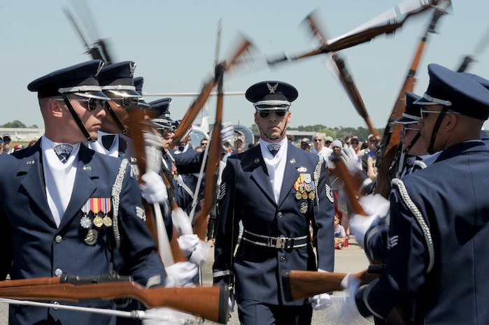 Tech. Sgt. Jeremy Gustch, the NCO in charge of the U.S. Air Force Honor Guard Drill Team, marches through the Gauntlet during the Air and Space Expo at Joint Base Charleston, S.C., April 28, 2018. The Gauntlet is a routine where the commander marches up and back through spinning weapons, displaying the trust and confidence he has in the team’s skills and precision. The 2018 Air and Space Expo provided the public with a look at various military assets and missions, while strengthening community relations and educating attendees on air and space power. The 2018 Air and Space offered more than 50 demonstrations and displays ranging from Science, Technology, Engineering and Mathematics activities to World War II static display aircraft and aerial demonstration performances highlighting the F-16 Fighting Falcon, C-17 Globemaster III, F-86 Sabre and more.