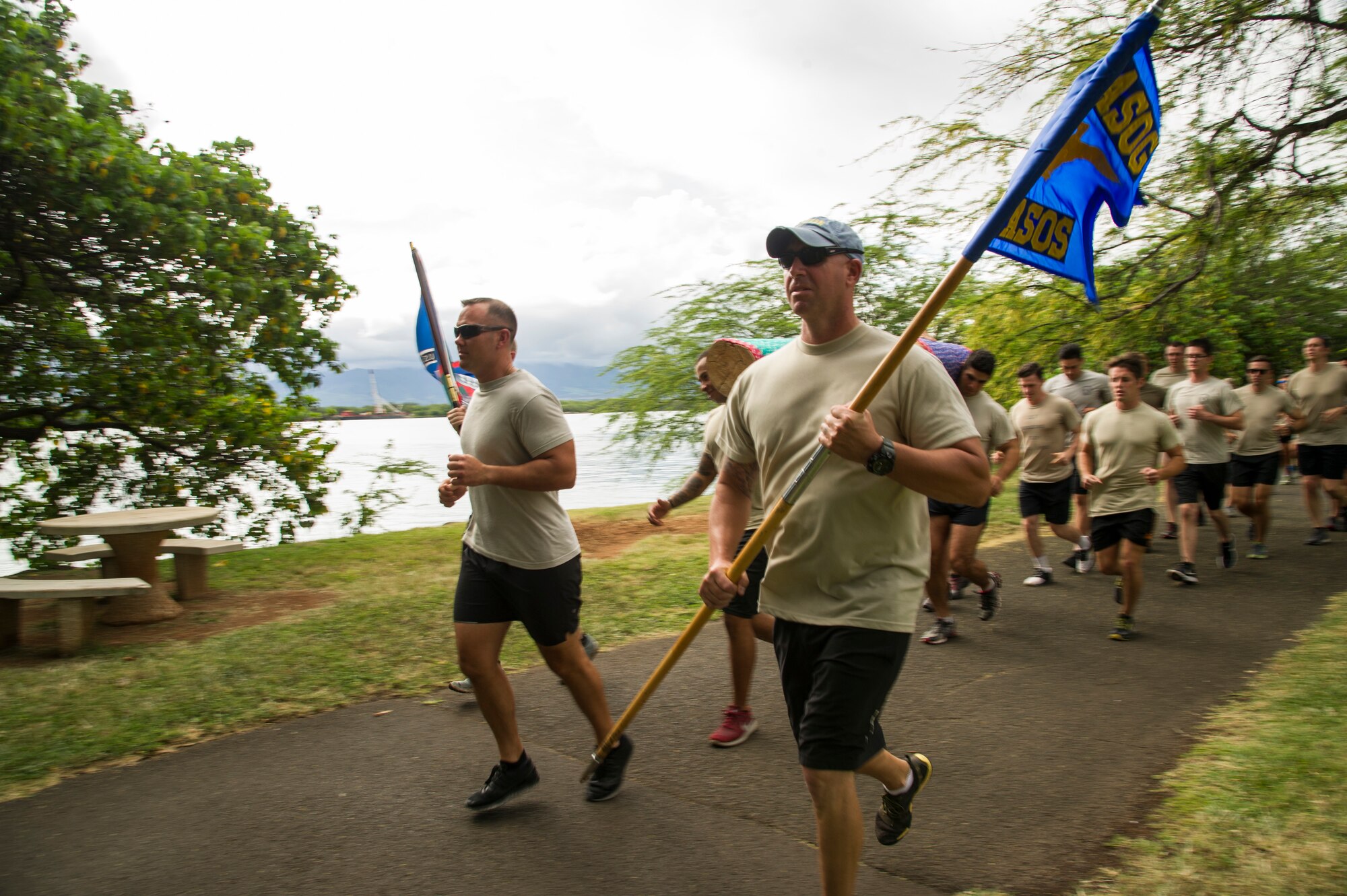 Members from the 25th Air Support Operations Squadron jog on the running path overlooking Pearl Harbor during the Annual Tactical Air Control Party (TACP) Association’s Remembrance Run on Joint Base Pearl Harbor-Hickam, Hawaii, April 26, 2018. The TACP Association seeks to remember the fallen by providing support to TACPs who were wounded and assisting the families of those killed in action. (U.S. Air Force photo by Tech. Sgt. Heather Redman)