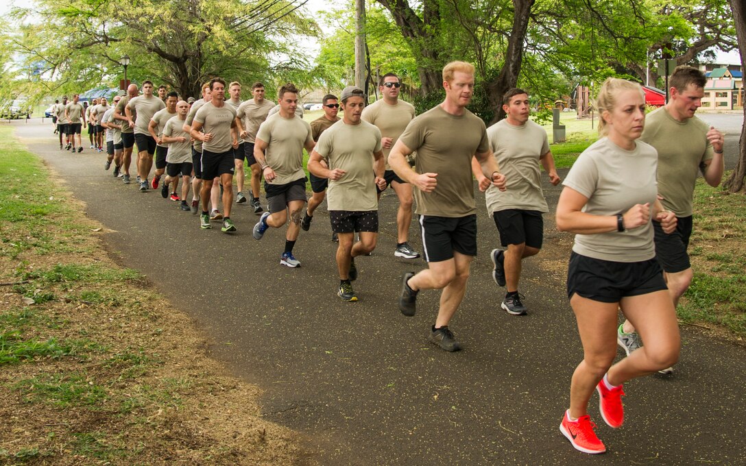 Members from the 25th Air Support Operations Squadron jog on the running path overlooking Pearl Harbor during the Annual Tactical Air Control Party (TACP) Association’s Remembrance Run on Joint Base Pearl Harbor-Hickam, Hawaii, April 26, 2018. The TACP Association seeks to remember the fallen by providing support to TACPs who were wounded and assisting the families of those killed in action. (U.S. Air Force photo by Tech. Sgt. Heather Redman)