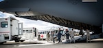 59th Medical Wing CCATT team members, in conjunction with mission partners, transition from their aircraft to an ambulance during an infant patient transport mission from Germany to Walter Reed National Medical Center, Bethesda, Md., April 19th, 2018. Examples of conditions requiring CCATT support include supportive or resuscitate care of shock/hemorrhage, respiratory failure, and multi-system trauma.