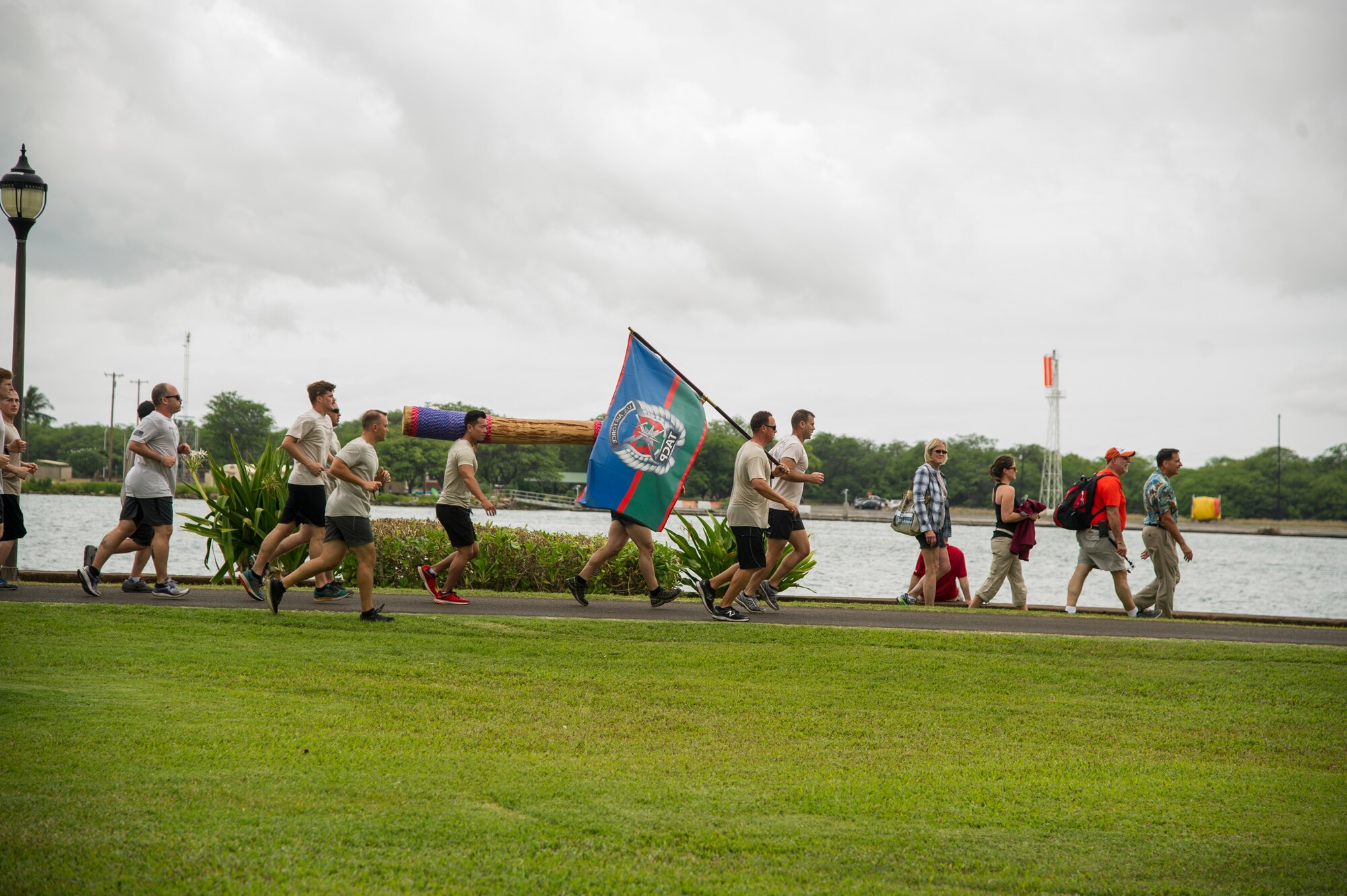 Members from the 25th Air Support Operations Squadron jog on the running path overlooking Pearl Harbor during the Annual Tactical Air Control Party (TACP) Association’s Remembrance Run on Joint Base Pearl Harbor-Hickam, Hawaii, April 26, 2018. The TACP Association seeks to remember the fallen by providing support to TACPs who were wounded and assisting the families of those killed in action. (U.S. Air Force photo by Tech. Sgt. Heather Redman)