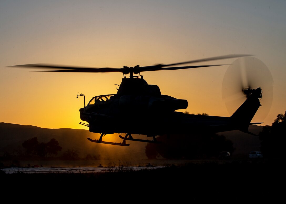 An AH-1Z Viper with Marine Light Attack Helicopter Squadron (HMLA) 469, Marine Aircraft Group 39, 3rd Marine Aircraft Wing, lands during forward arming and refueling point operations at Marine Corps Base Camp Pendleton, Calif., April 26. Marine Wing Support Squadron (MWSS) 372, MAG-39, 3rd MAW and HMLA-469 conducted a day and night FARP for training in aerial operations support. (U.S. Marine Corps photo by Lance Cpl. Clare J. McIntire/Released)