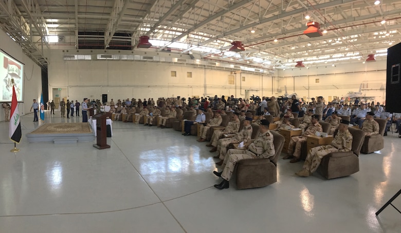 Ribbon Cutting Ceremony at Balad Air Base in the Aircraft Maintenance Hanger that is a 75,000 square feet facility that can accommodate seven F16 aircraft.