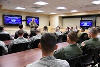 U.S. Army Maj. Gen. Michael Navrkal, mobilization assistant to the deputy commander of U.S. Strategic Command (USSTRATCOM), briefs U.S. Army Command and General Staff College nuclear enterprise students about USSTRATCOM’s mission at Offutt Air Force Base, Neb., May 1, 2018. During their visit students met with senior leaders and received USSTRATCOM and 625th Strategic Operations Squadron briefings. One of nine Department of Defense unified combatant commands, USSTRATCOM has global responsibilities assigned through the Unified Command Plan that include strategic deterrence, nuclear operations, space operations, joint electromagnetic spectrum operations, global strike, missile defense, and analysis and targeting.