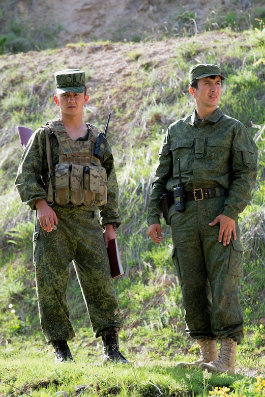 Lt. Azimov Farzod, company commander of the special company, Tajikistan Peacekeeping Battalion of the Mobile Forces, observes a traffic control point with Capt. Islomzoda Fakhriddin, commander, Tajikistan Peacekeeping Battalion of the Mobile Forces, at a mountain training camp outside of Dushanbe, Tajikistan, April 24, 2018, during an information exchange between Tajik and American forces. This information exchange was part of a larger military-to-military engagement taking place with the Tajikistan Peacekeeping Battalion of the Mobile Forces and the 648th Military Engagement Team, Georgia Army National Guard, involving border security tactics and techniques.