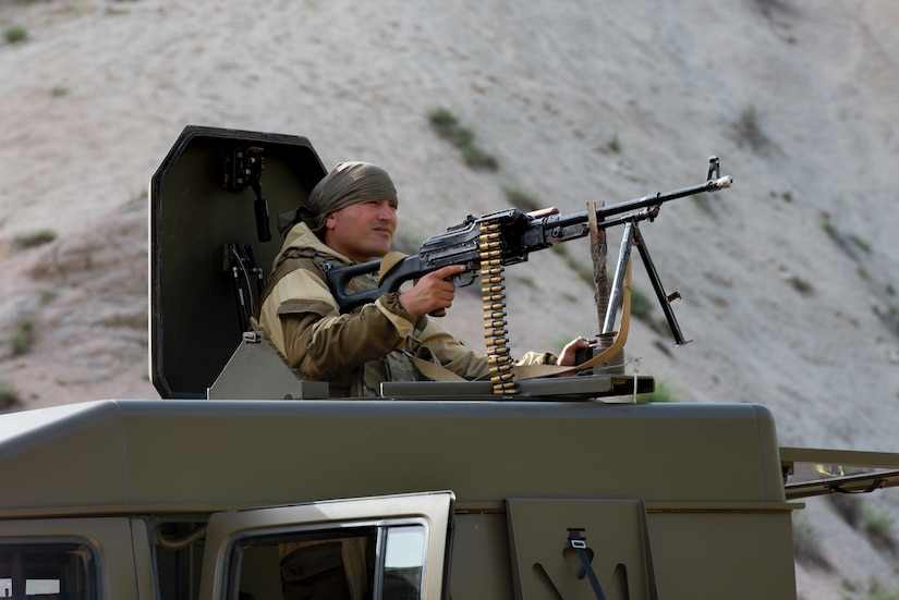 A Tajik soldier covers an avenue of approach at a traffic control point at a mountain training camp outside of Dushanbe, Tajikistan, April 24, 2018, during an exercise to exchange tactics between Tajik and U.S. forces. This information exchange was part of a larger military-to-military engagement taking place with the Tajikistan Peacekeeping Battalion of the Mobile Forces and the 648th Military Engagement Team, Georgia Army National Guard, involving border security tactics and techniques.