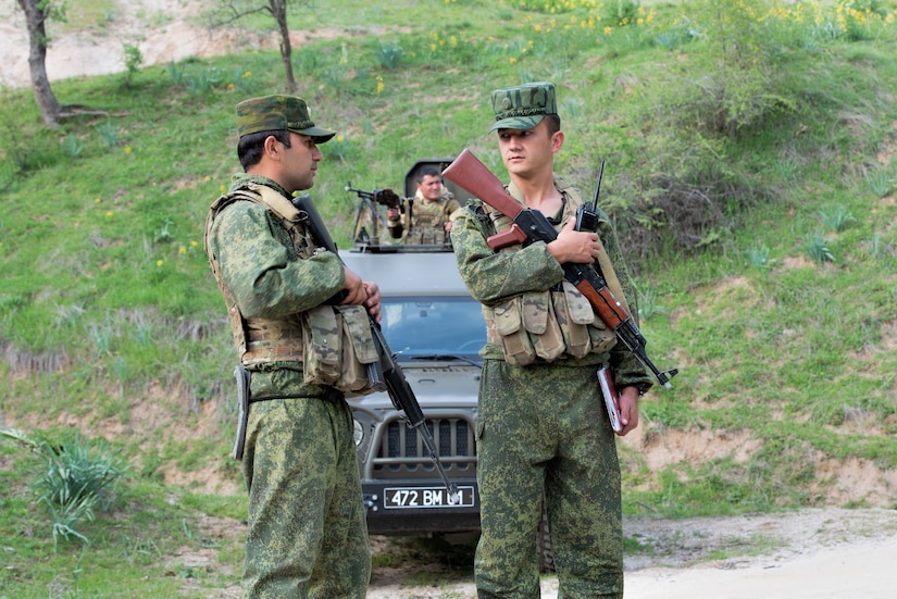 Lt. Azimov Farzod, company commander of the special company, Tajikistan Peacekeeping Battalion of the Mobile Forces, receives information from one of his soldiers at a traffic control point at a mountain training camp outside of Dushanbe, Tajikistan, April 24, 2018, during an exercise to exchange tactics between Tajik and U.S. forces. This information exchange was part of a larger military-to-military engagement taking place with the Tajikistan Peacekeeping Battalion of the Mobile Forces and the 648th Military Engagement Team, Georgia Army National Guard, involving border security tactics and techniques.