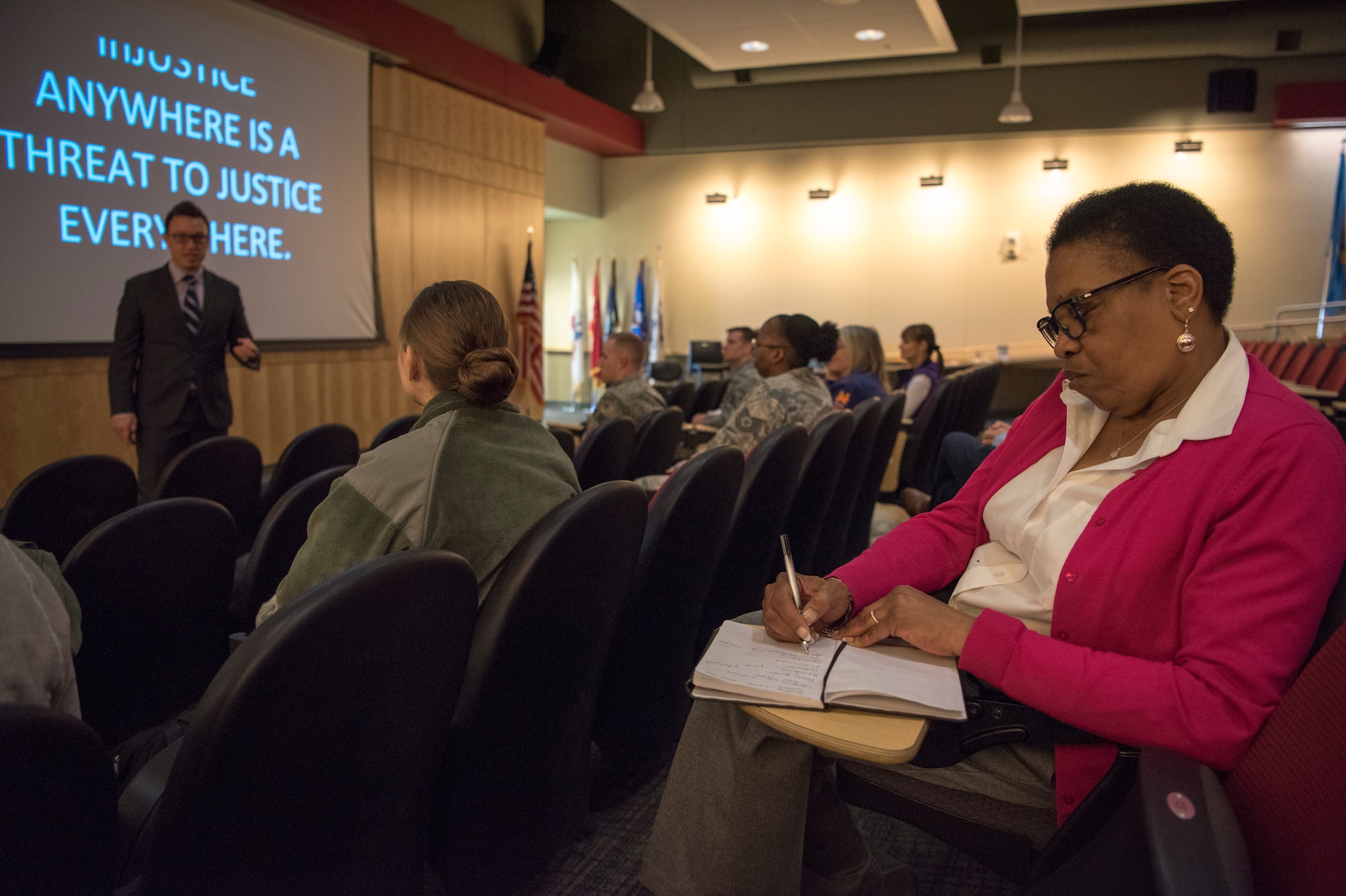 Military and civilian personnel attend a Sexual Assault Prevention and Response educational opportunity at Joint Base Elmendorf-Richardson, Alaska, April 23, 2018. The guest speaker, We End Violence director Jeffrey Bucholtz, spoke to the audience about sexualized violence and what the community can do to change cultural norms.