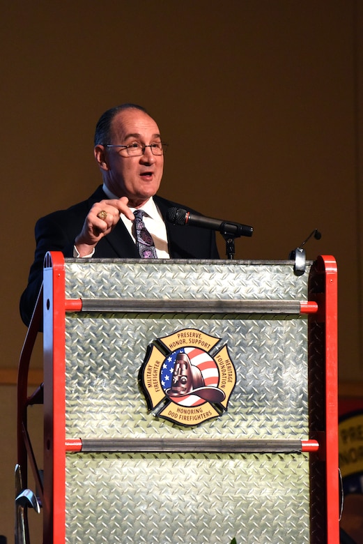 U.S. Fire Administrator Chief, Keith Bryant, guest speaker for the 16th Annual Firefighter Ball, speaks on his personal experiences while being a firefighter in the U.S. Army during the ball at the McNease Convention Center, San Angelo, Texas, April 28, 2018. This year marks the 16th Annual Firefighter Ball held to honor past and present Department of Defense firefighters hosted by the Military Firefighter Heritage Foundation. (U.S. Air Force photo by Airman 1st Class Seraiah Hines/Released)