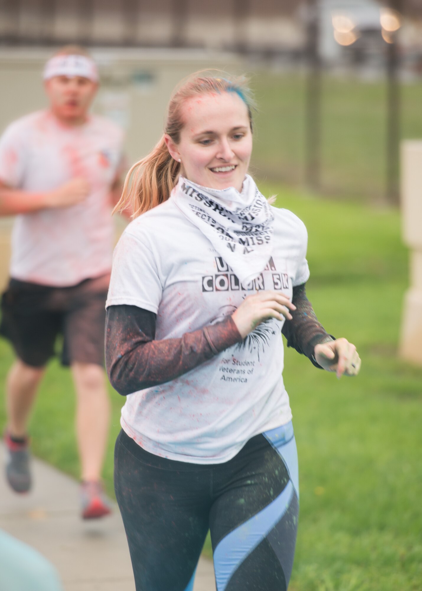 A Team Dover Airman approaches the halfway point of the Sexual Assault Awareness Month Color Run April 25, 2018, at Dover Air Force Base, Del. Approximately 150 runners participated in the annual 5k run. (U.S. Air Force photo by Mauricio Campino)