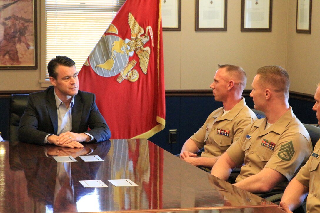Senator Todd Young of Indiana (left) discussed his time in the Marine Corps with Marine Staff Sgt. William Huntley III (center) and Marine Staff Sgt. Travis Gann (right) aboard Marine Corps Recruiting Station Indianapolis headquarters, May 1, 2018. Sen. Young is a Marine Corps veteran, U.S. Naval Academy graduate and former Marine Officer. Photo by U.S. Marine Corps Staff Sgt. Tyler Mitchell.