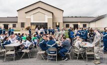 At the conclusion of the Wingman Day Amazing Race, Team Dover members are treated to hamburgers and hot dogs April 27, 2018, at the Base Chapel on Dover Air Force Base, Del. The Dover First Sergeant’s Council cooked and served food to more than 400 individuals. (U.S. Air Force photo by Roland Balik)