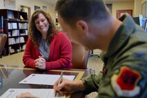 Jennifer, a 432nd Wing/432nd Air Expeditionary Wing sexual assault prevention and response victim’s advocate, and Col. Julian Cheater, 432nd WG/432nd AEW commander, sign the Creech Sexual Assault Awareness and Prevention Month proclamation for April, March 21, 2018, at Creech Air Force Base, Nev. In the proclamation, Cheater urges all Airmen to increase their participation in the efforts to prevent sexual assault and thereby strengthening the U.S. Air Force community. (U.S. Air Force photo by Airman 1st Class Haley Stevens)