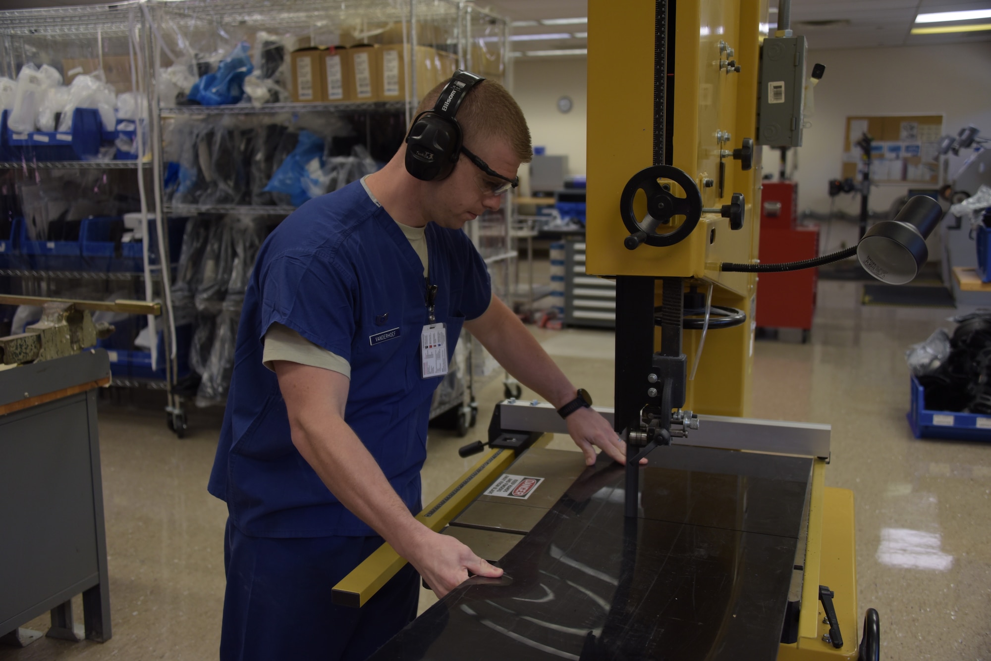 Tech. Sgt. Michael Vanderhoef, 60th Surgical Operations Squadron noncommissioned officer in charge of the Orthotics Lab, demonstrates the process for making an orthotics brace April 17, 2018 inside David Grant USAF Medical Center at Travis Air Force Base, Calif. In the last year, the Orthotics Lab has cared for more than 4,000 patients and produced nearly 1,000 custom fabricated devices. (U.S. Air Force photo by Tech. Sgt. James Hodgman)