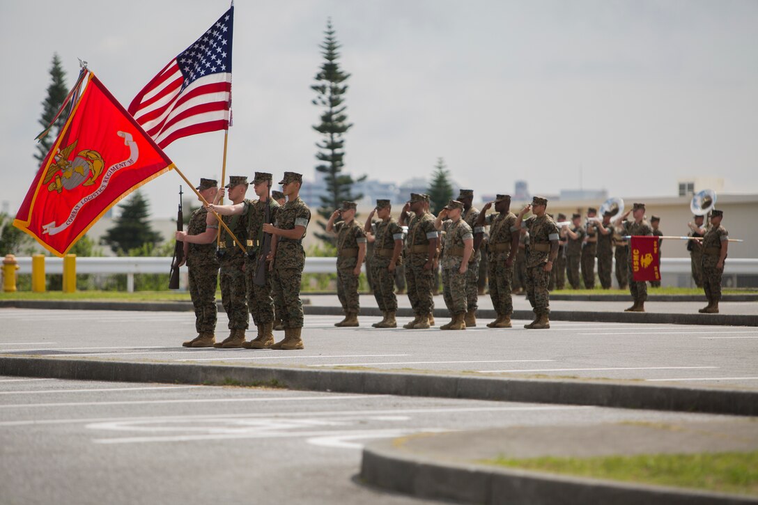 Marines with Combat Logistics Regiment 35, 3rd Marine Logistics Group, salute as the National Anthem plays during the regimental change of command ceremony May 1, 2018 at Camp Kinser, Okinawa, Japan. Col. Forrest C. Poole relinquished command of CLR-35 to Lt. Col. Kenric D. Stevenson. Poole is a native of Sharpesburg, Georgia. Stevenson is a native of DeRidder, Louisiana. (U.S. Marine Corps photo by Lance Cpl. Jamin M. Powell)