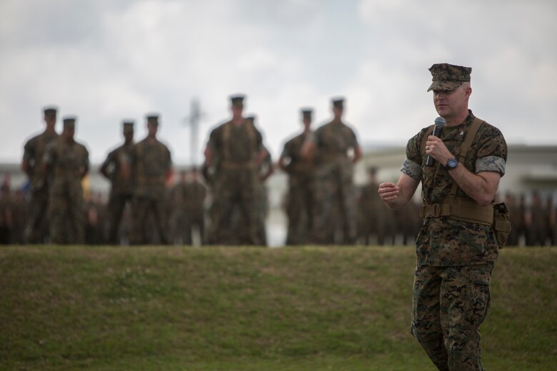 Col. Forrest C. Poole, the departing commanding officer of Combat Logistics Regiment 35, thanks the Marines of CLR-35 during the regimental change of command ceremony May 1, 2018 on Camp Kinser, Okinawa, Japan. Poole relinquished command of CLR-35 to Lt. Col. Kenric D. Stevenson. Poole is a native of Sharpesburg, Georgia. (U.S. Marine Corps photo by Lance Cpl. Jamin M. Powell)