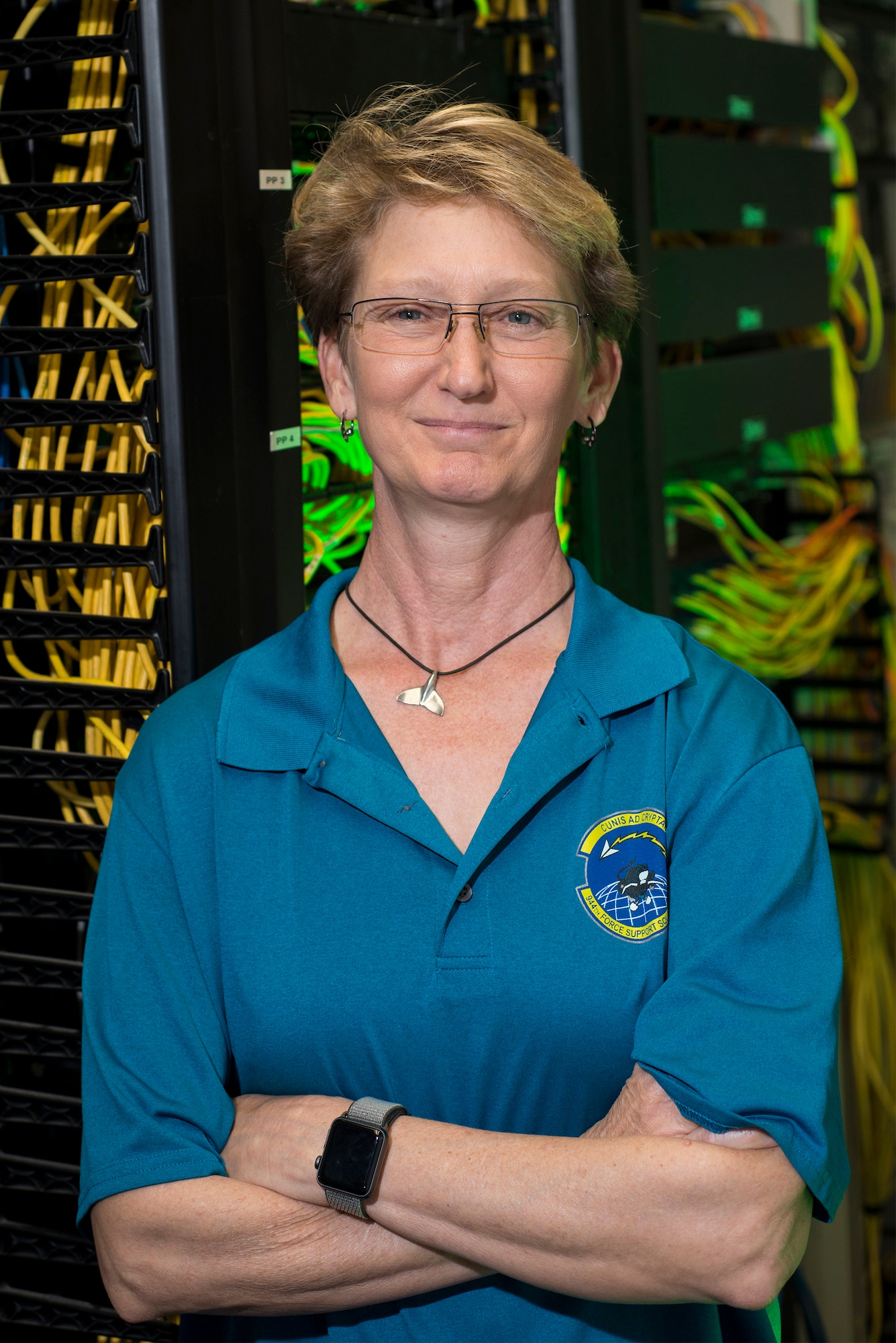 Fran Kramer, former 944th Fighter Wing network administrator, poses for a photo, April 12. Kramer served as the wing's first and main network administrator for the past 21 years.