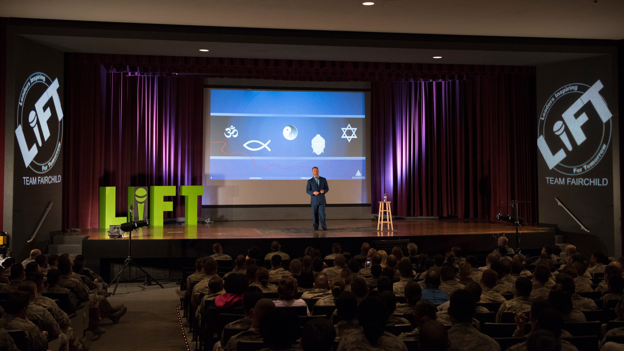 Dov Baron, Leadership Development headline speaker, relates his experiences of finding purpose after a suffering a terrible injury at the Leaders Inspiring For Tomorrow event at Fairchild Air Force Base, Washington, April 27, 2018.  Baron spoke to personal pain becoming a powerful motivator in his life; the resolution of that pain becoming the reason and fulfilling reward of pursuing that found purpose, which he freely shares with others to this day. (U.S. Air Force Photo/SrA Ryan Lackey)