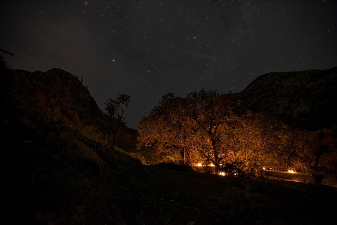 A simulated ambush takes place with Tajik and U.S. Soldiers in the early morning at a mountain training camp outside of Dushanbe, Tajikistan, April 24, 2018, during an exercise to exchange tactics between Tajik and U.S. forces. This information exchange was part of a larger military-to-military engagement taking place with the Tajikistan Peacekeeping Battalion of the Mobile Forces and the 648th Military Engagement Team, Georgia Army National Guard, involving border security tactics and techniques.