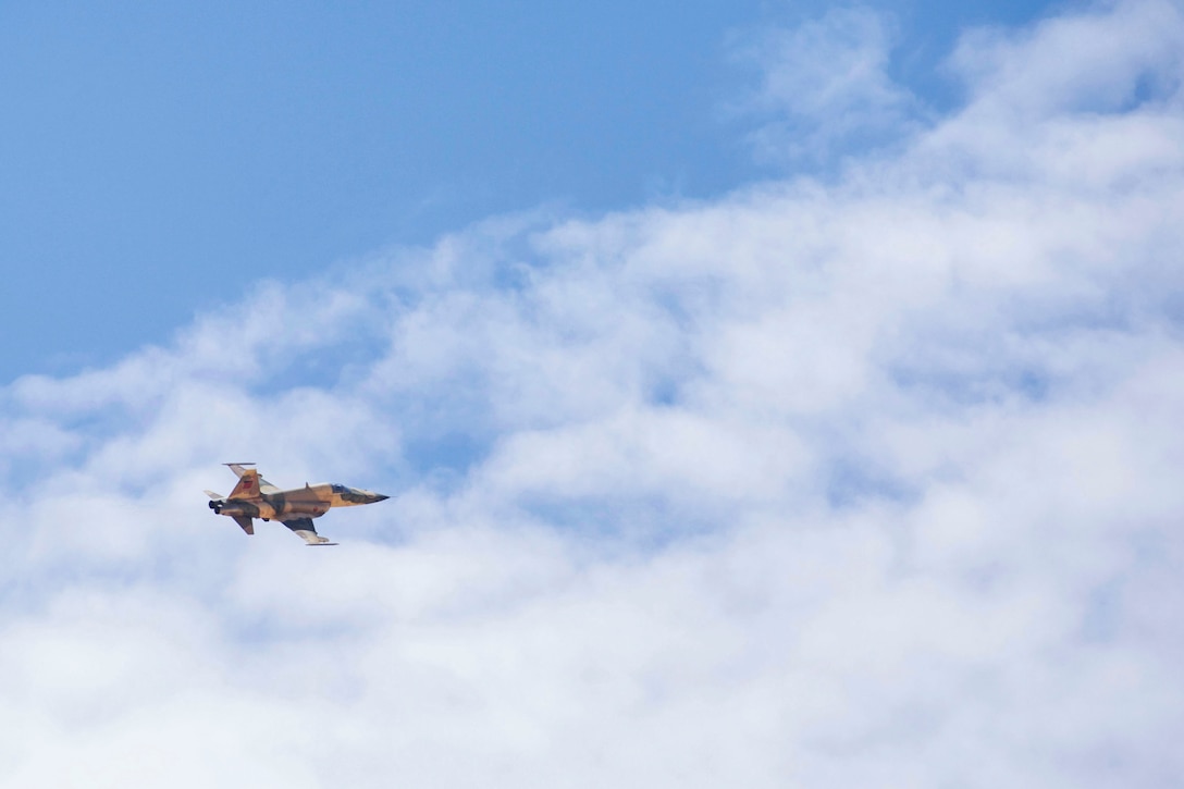 A Moroccan F5 aircraft provides close air support during Exercise African Lion 2018 in Tan Tan, Morocco, April 23, 2018. African Lion is an annual, multinational, joint-force exercise improving interoperability between participating nations. (U.S. Marine Corps photo by Lance Cpl Tessa D. Watts)