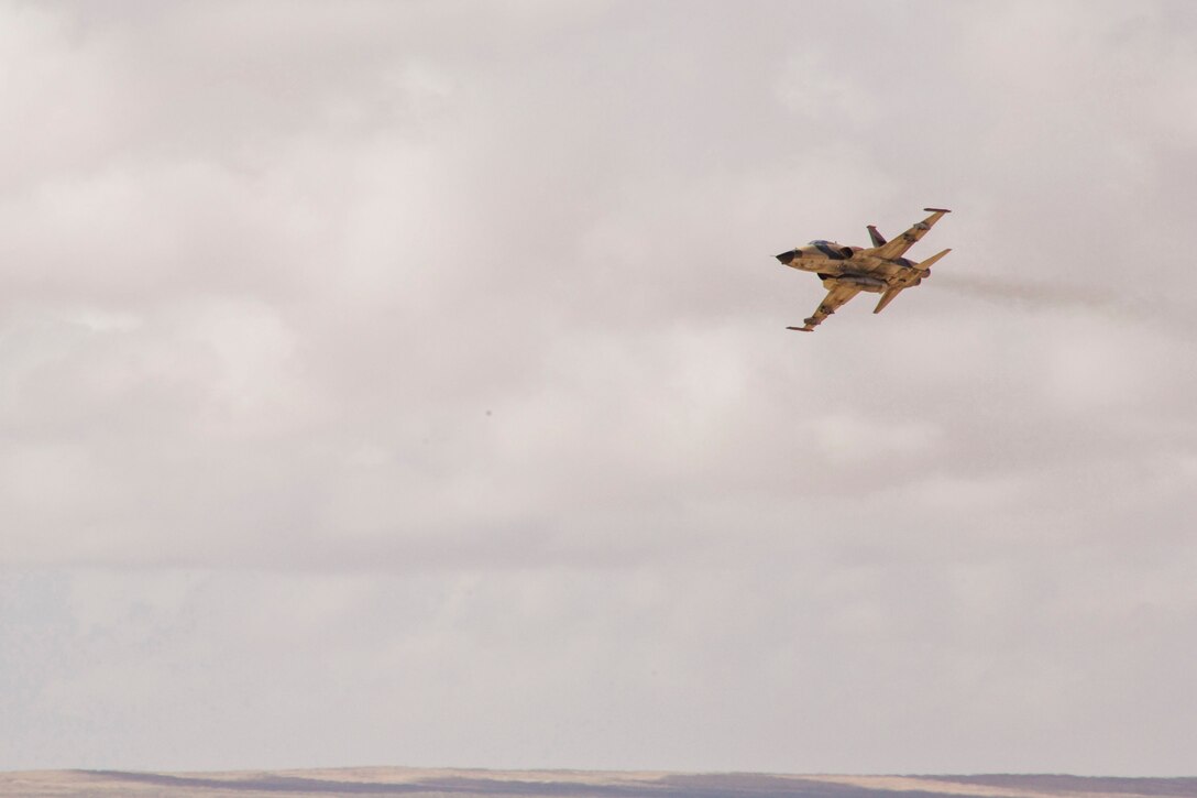 A Moroccan F5 aircraft provides close air support during Exercise African Lion 2018, in Tan Tan, Morocco, April 23, 2018. African Lion is an annual, multinational, joint-force exercise improving interoperability between participating nations. (U.S. Marine Corps photo by Lance Cpl. Tessa D. Watts)