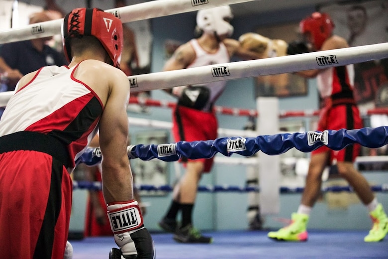 Marines with the 1st Marine Division Boxing team spar in the ring to prepare for their upcoming fight against the Royal Marines in England, May 3 and 8, 2018.