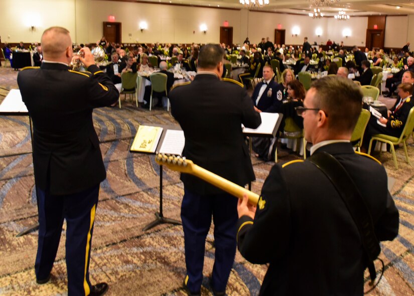 The U.S. Army 392nd Army Band Jazz Combo performs music medleys at the Fort Eustis 100th Anniversary Gala in Newport News, Virginia, April 28, 2018. Gala attendees continued the celebration with a cake cutting ceremony and a video presentation. (U.S. Air Force photo by Airman 1st Class Monica Roybal)