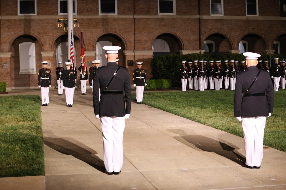 The Commandant of the Marine Corps, Gen. Robert B. Neller, and Col. Tyler J. Zagurski, commanding officer of Marine Barracks Washington prepare for Pass and Review at Marine Barracks Washington, Washington, D.C., April 26, 2018. Evening parades are held to honor senior officials, distinguished citizens and supporters of the Marine Corps.(Marine Corps photo by Pfc. James Bourgeois/ Released)