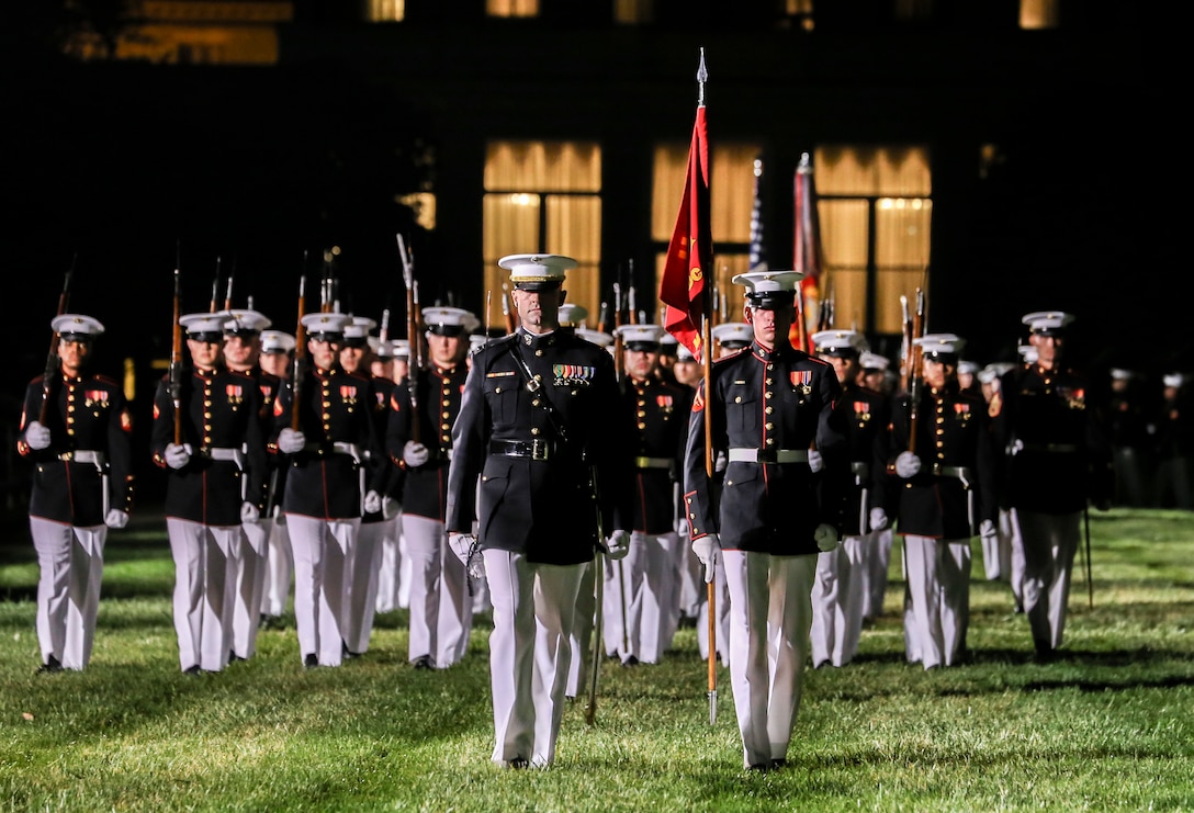 Marines with Alpha Company, Marine Barracks Washington D.C. conduct pass in review during a Friends and Family Ceremony at the Barracks, April 27, 2018. The guest of honor for the parade was the Commandant of the Marine Corps Gen. Robert B. Neller, and the hosting official was the Barracks’ Commanding Officer Col. Tyler J. Zagurski. (Marine Corps photo by Pfc. James Bourgeois/Released)