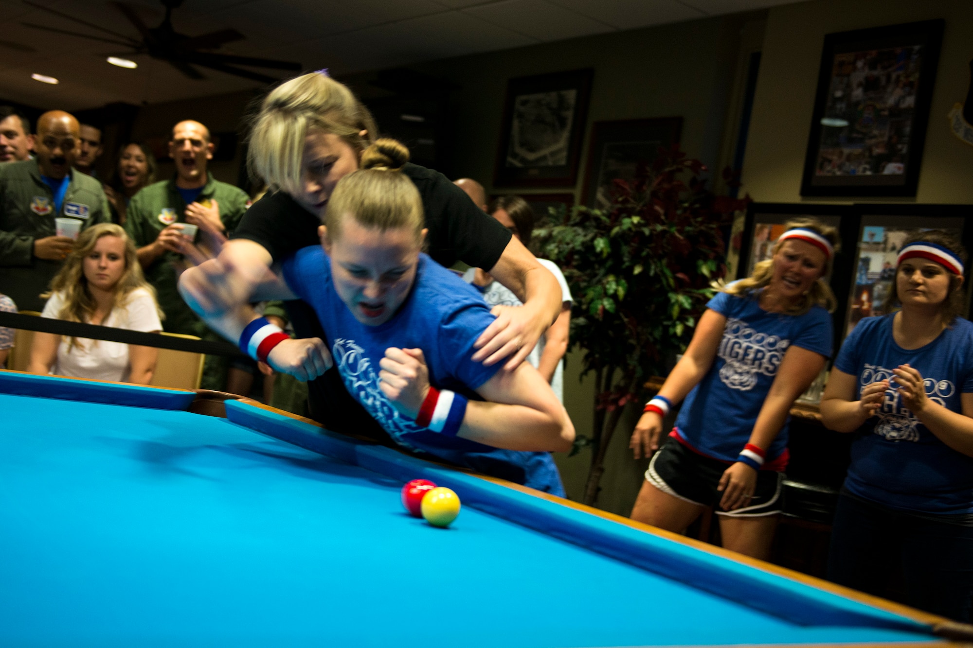 Adrianne Razack, right, and Meredith Shannon, crud players, engage each other during a spouses crud tourney, April 27, 2018, at Moody Air Force Base, Ga. The Moody spouses built the event around teamwork and comradery, giving them an opportunity to experience a long-held tradition amongst the Air Force fighter and rescue squadrons. Though the game originated in the Royal Canadian Air Force, it has since been adopted by the U.S. (U.S. Air Force photo by Airman 1st Class Erick Requadt)