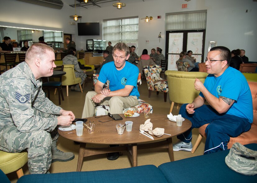 Dover Air Force Base Fitness Center Staff enjoy their lunch break at Mugs Coffee Bar April 27, 2018, at Dover Air Force Base, Del. Mugs is located a short walking distance from the dormitories and has hours to accommodate Airmen working various shifts. (U.S. Air Force photo by Mauricio Campino)