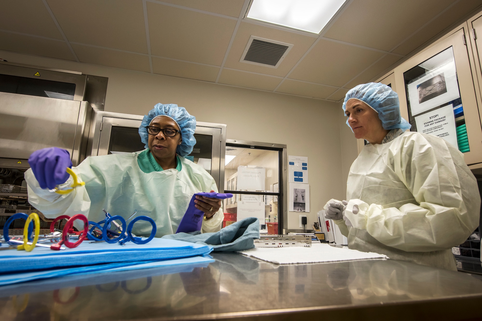 Col. Jennifer Short, right, 23d Wing commander, and Sandra Pittman, 23d Medical Group (MDG) dental assistant, inspect cleaning tools, April 30, 2018, at Moody Air Force Base, Ga. Short toured the 23d MDG to gain a better understanding of their overall mission, capabilities, and comprehensive duties, and was able to experience the day-to-day operations of the various units within the 23d MDG, ranging from bioenvironmental to ambulatory care. (U.S. Air Force photo by Airman 1st Class Eugene Oliver)