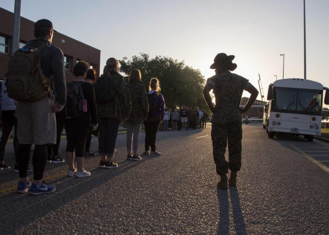 Staff Sgt. Morgan Drinkard, a drill instructor with 4th Recruit Training Battalion, observes attendees of the Educators Workshop aboard Marine Corps Recruit Depot Parris Island, South Carolina, April 18, 2017. These educators traveled from Recruiting Station (RS) Baton Rouge and RS Columbia to experience the Educators Workshop. The workshop allows educators to have an inside look at educational benefits and career opportunities in the Marine Corps to better inform their students. (U.S. Marine Corps photo by Lance Cpl. Jack A. E. Rigsby)