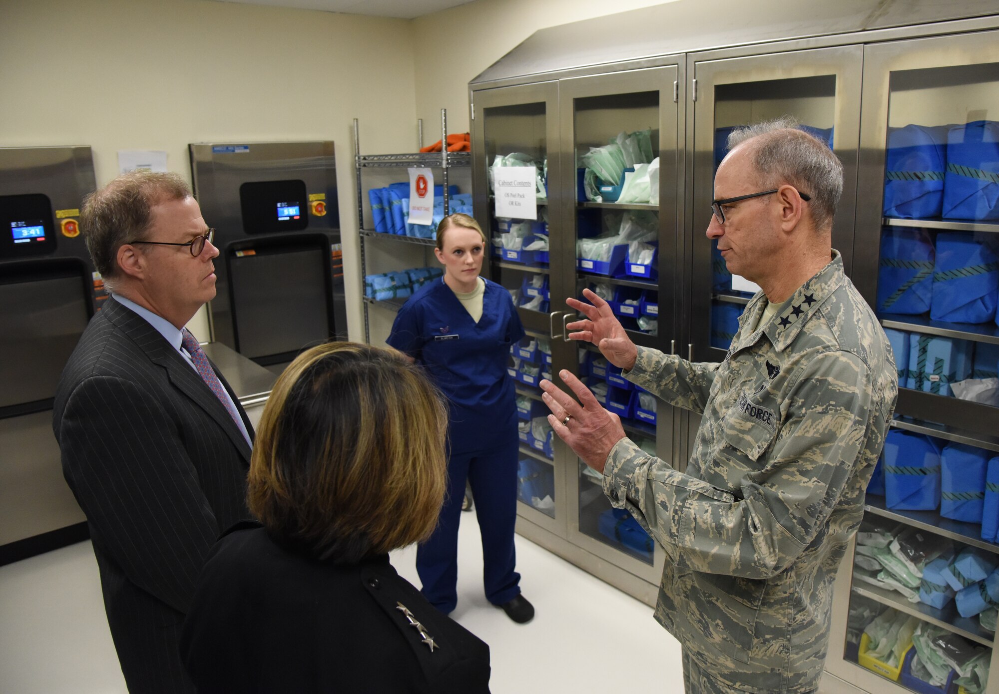 U.S. Air Force Lt. Gen. Mark Ediger, Air Force Surgeon General, right, discusses the 81st Dental Squadron clinic renovations with Thomas McCaffery, Acting Assistant Secretary of Defense for Health Affairs, and U.S. Navy Vice Adm. Raquel Bono, Defense Health Agency director, at the Keesler Medical Center during a site visit at Keesler Air Force Base, Mississippi, April 27, 2018. The purpose of the visit was to get oriented with base operations and the Keesler Medical Center. The visit also included an office call with 2nd AF leadership and tours of the Clinical Research Lab and Radiology Oncology. (U.S. Air Force photo by Kemberly Groue)
