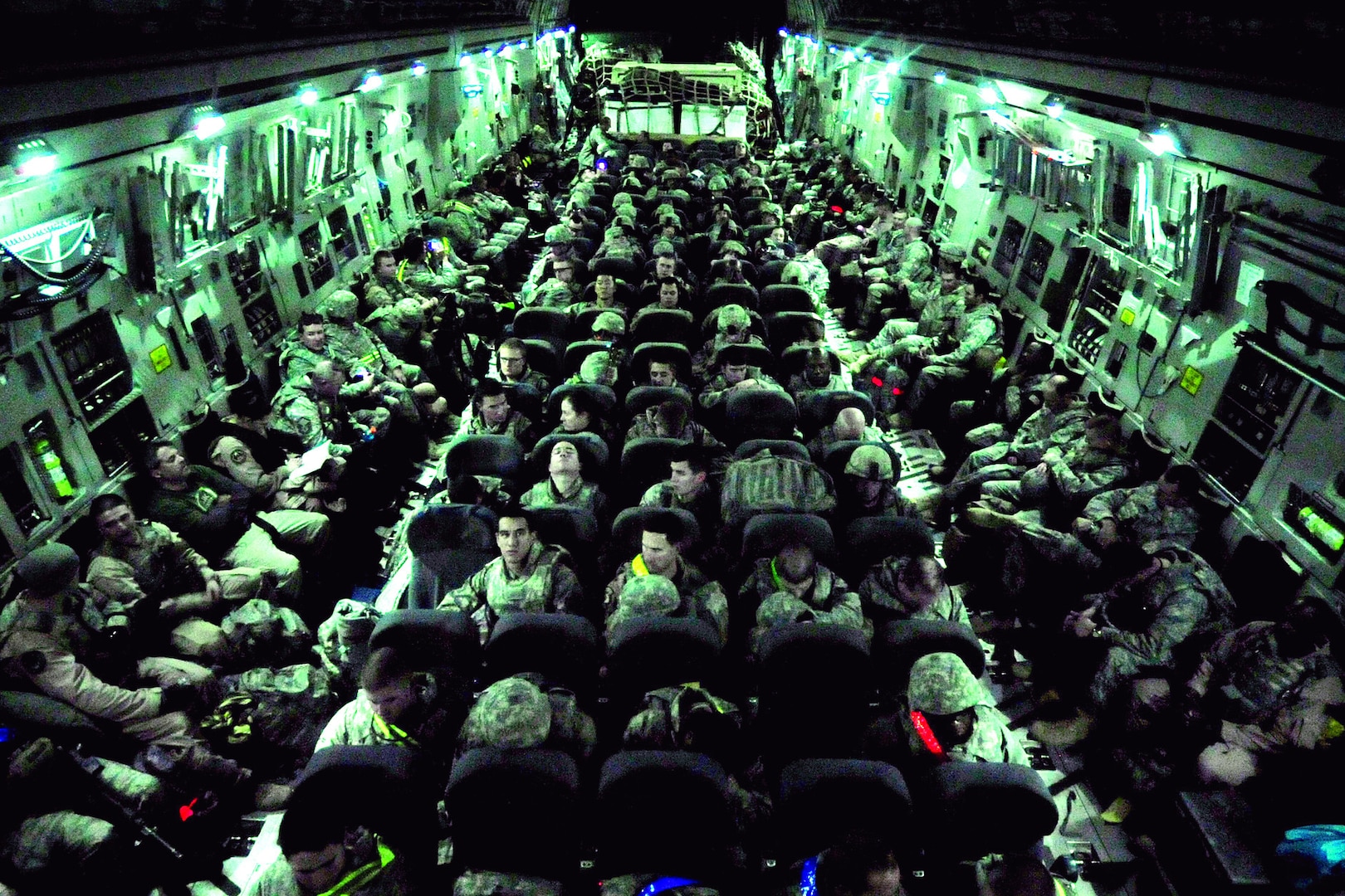 Airmen of the 407th Air Expeditionary Group prepare to take-off on a  C-17 Globemaster III cargo aircraft at Ali Air Base, Iraq, Dec. 18, 2011. These  Airmen are the last service members to fly out of  Iraq.  The last remaining U.S. Airmen left Iraq per the Iraq and U.S. 2008 Security Agreement that required all U.S. service members to be out of the country by  Dec. 31. Since 2003, more than 1 million Airmen, Soldiers, Sailors and Marines have served in Iraq. (U.S. Air Force photo/Master Sgt. Cecilio Ricardo)