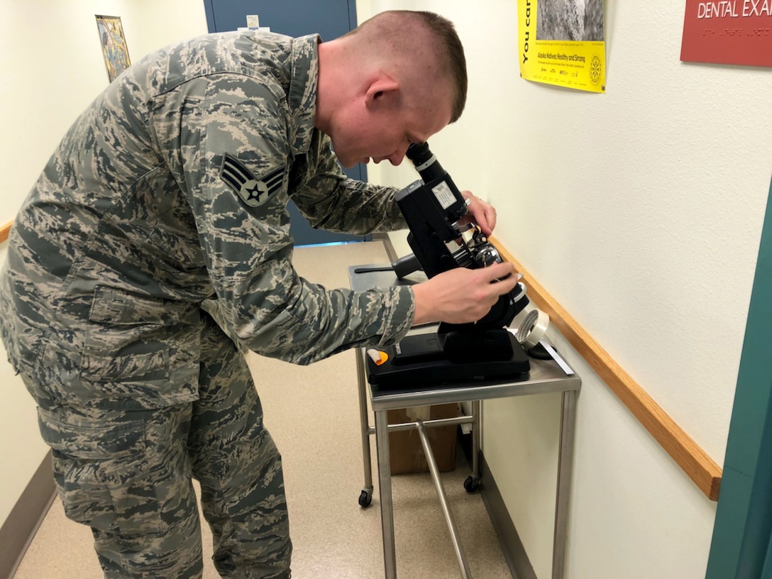 Senior Airman Elliott Bull, 419th Medical Squadron, gets a lensometry reading during a deployment to Alaska.