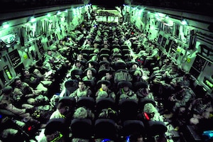 Airmen of the 407th Air Expeditionary Group prepare to take-off on a  C-17 Globemaster III cargo aircraft at Ali Air Base, Iraq, Dec. 18, 2011. These  Airmen are the last service members to fly out of  Iraq.  The last remaining U.S. Airmen left Iraq per the Iraq and U.S. 2008 Security Agreement that required all U.S. service members to be out of the country by  Dec. 31. Since 2003, more than 1 million Airmen, Soldiers, Sailors and Marines have served in Iraq. (U.S. Air Force photo/Master Sgt. Cecilio Ricardo)