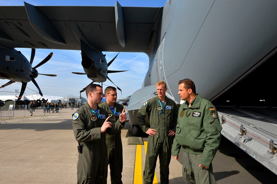 U.S. Airmen assigned to the 37th Airlift Squadron receive a briefing about the A400M Atlas from German air force 1st Lt. Felix, A400M co-pilot, in Berlin, Germany, April 27, 2018. According to aerospace corporation Airbus, there are 58 A400Ms in operation. (U.S. Air Force photo by Senior Airman Joshua Magbanua)