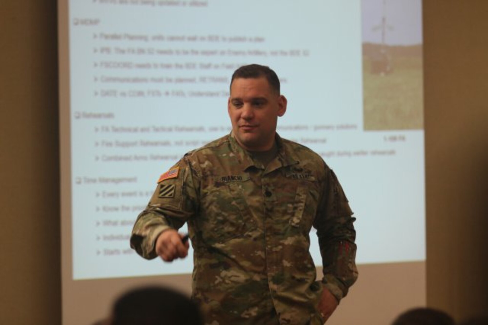 Lt. Col. Anthony Bianchi, 3-314th Field Artillery Battalion commander, briefs the attendees during the Northeast Regional Field Artillery Symposium on Joint Base McGuire-Dix-Lakehurst, New Jersey April 24, 2018. (U.S. Army photo by Sgt. 1st Class Corey Vandiver (Photo Credit: Sgt. 1st Class Corey Vandiver)