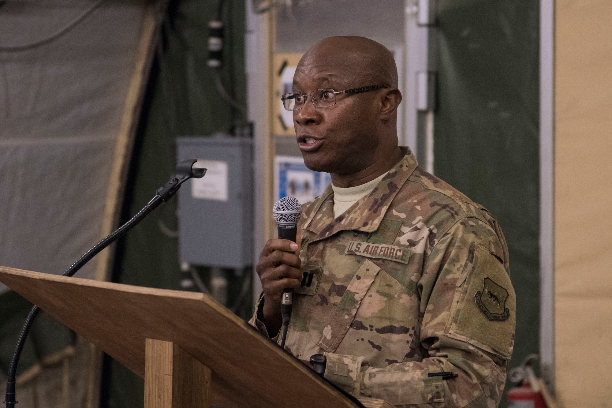 Capt. Brendan Mbagwu, 332nd Air Expeditionary Wing chaplain, recites a prayer during a breakfast the 332nd Air Expeditionary Wing held in observance of National Day of Prayer May 3, 2018, at an undisclosed location in Southwest Asia.