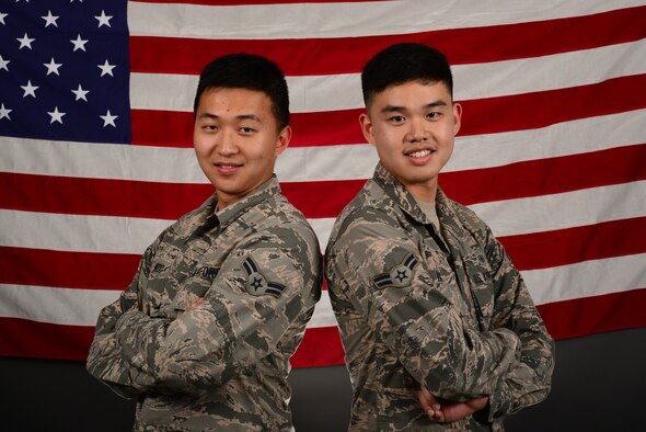 Airmen 1st Class Chansol Kim and Sanghoon Woo were recently naturalized as U.S. citizens. The two South Korean natives joined the Air Force for the opportunities; Woo plans on commissioning and becoming a pilot, while Kim plans on traveling the world. (U.S. Air Force photo/Senior Airman Benjamin N. Valmoja)